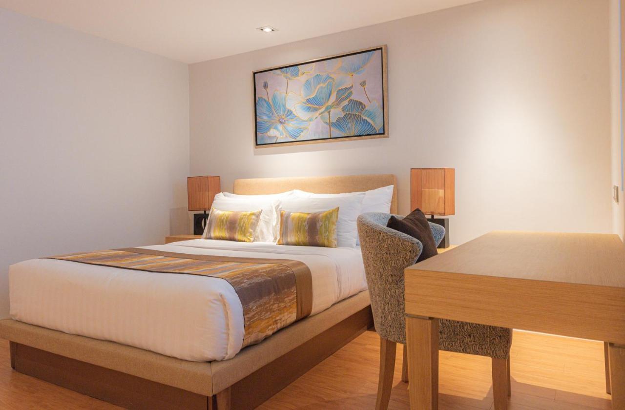 Summit Windmill Golf Suite Hotel At Suvarnabhumi Bangkok Zewnętrze zdjęcie A bedroom at the hotel